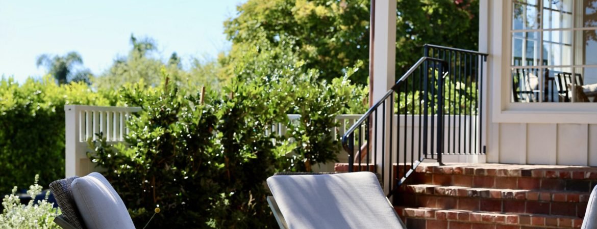Outdoor patio chairs around the fire pit