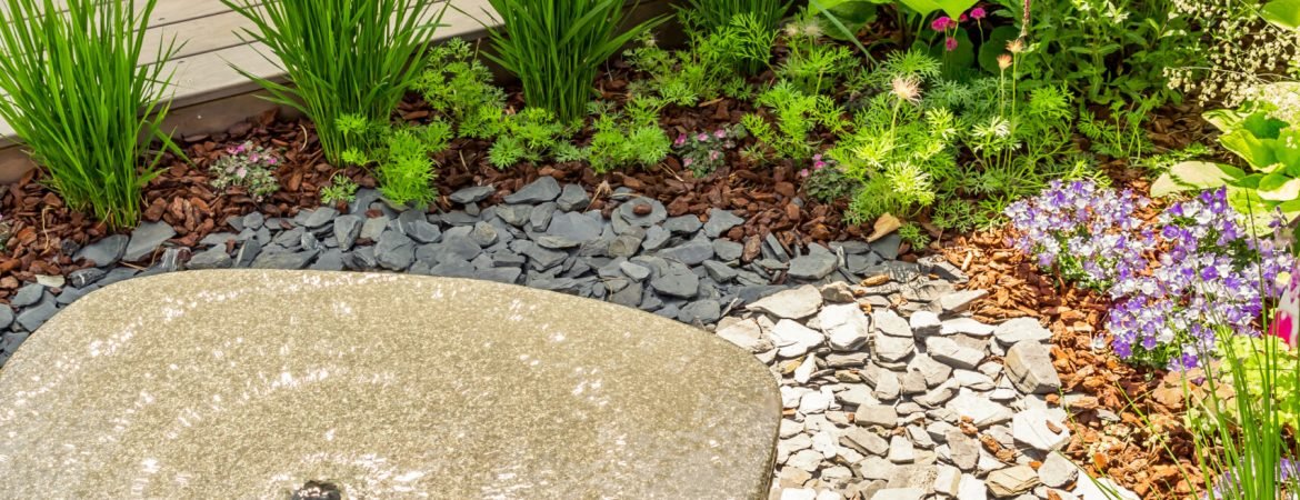 Small water fountain with  cozy seating area for terrace, garden or patio